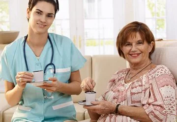 A carer chatting with a service user